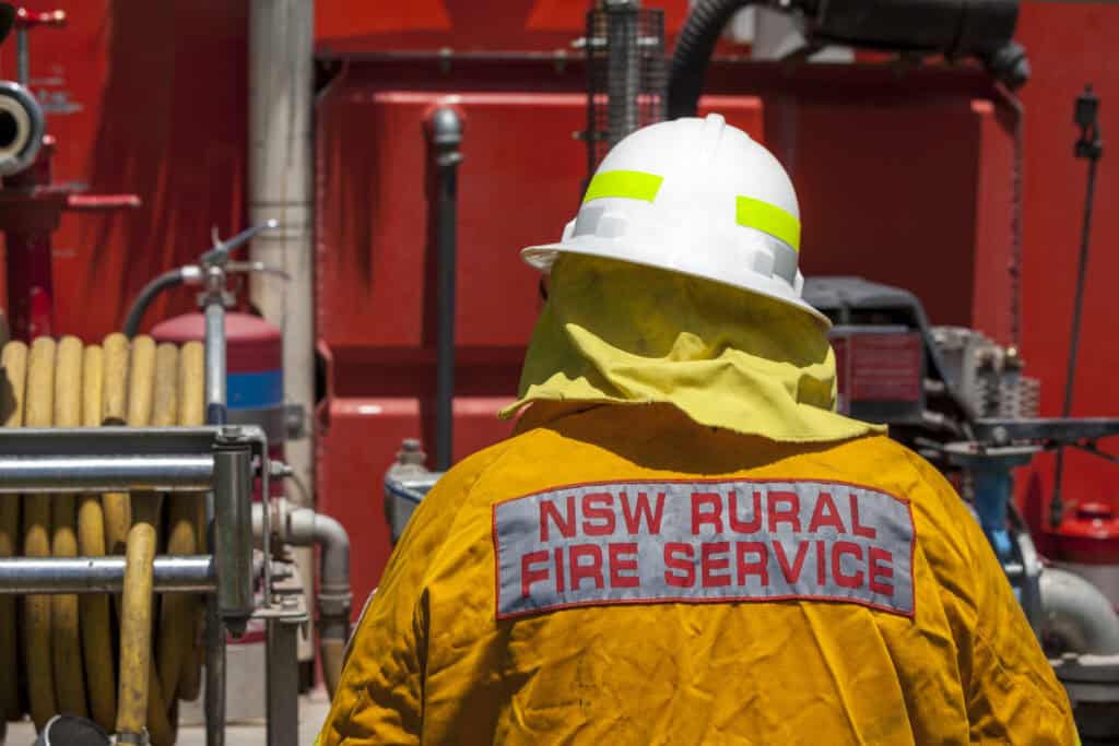 NSW rural fire fighter in protective clothing.