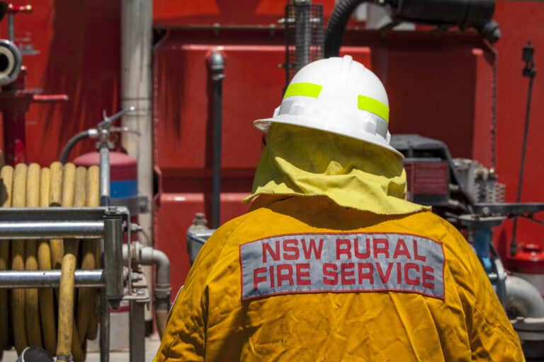 NSW rural fire fighter in protective clothing.