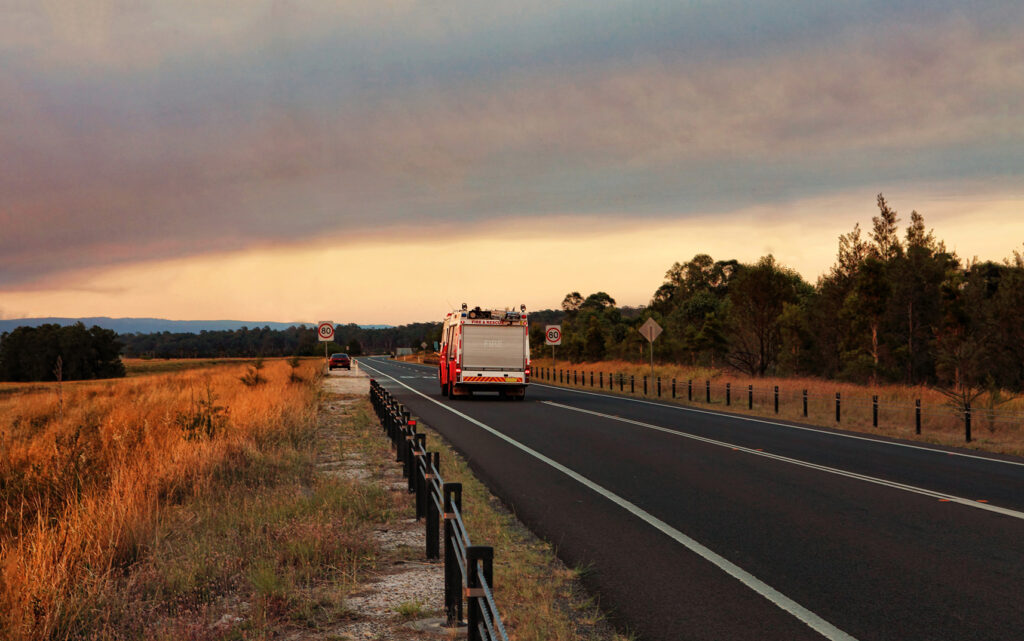 Rural Fire Service fire and rescue vehicle responds urgently to fire.