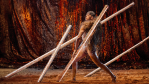 Bangarra Dance Theatre dancer in indigenous costume and body paint.