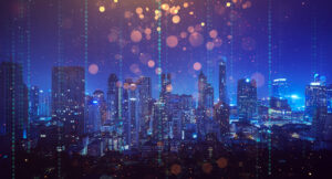 City skyline at night with binary code overlay.